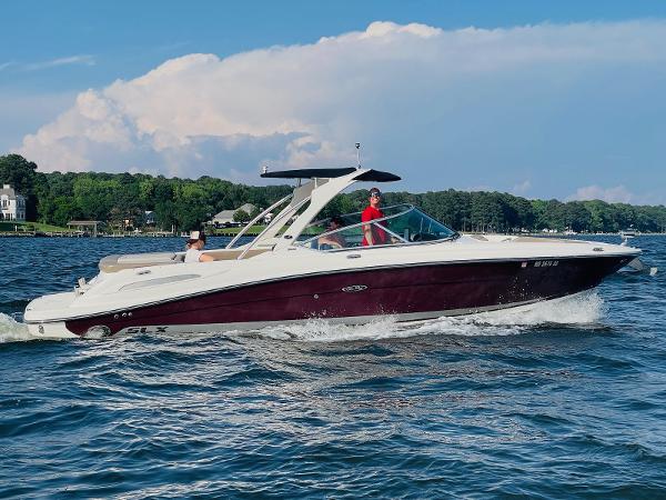 Sea Ray 270 SLX 2011 Sea Ray 270 SLX cruising on a scenic lake.