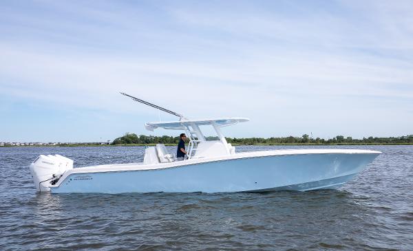 Invincible 39 Open Fisherman 2024 Invincible 39 Open Fisherman boat on water, side view.