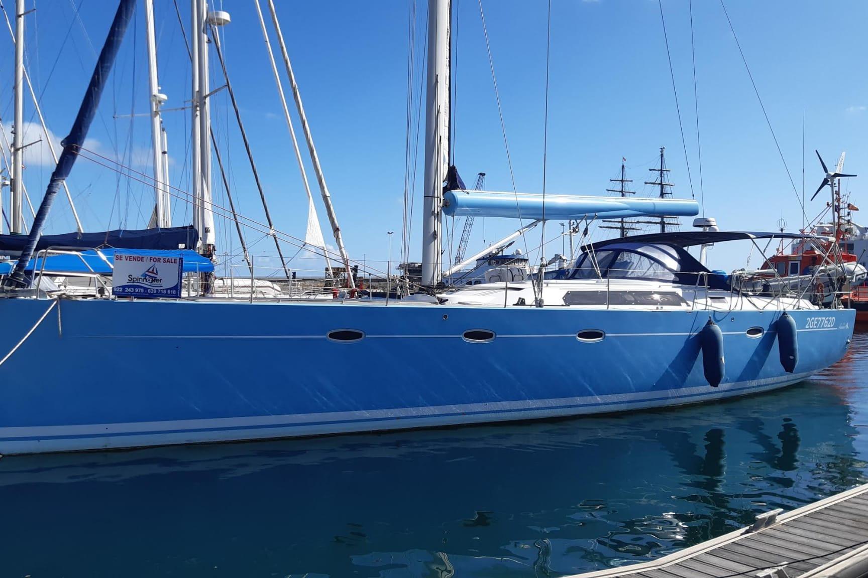 Hanse 531 Blue 2006 Hanse 531 sailboat docked, available for sale, under clear blue sky.