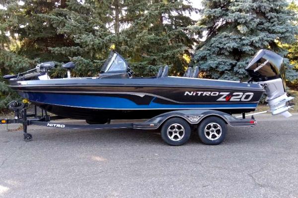 Nitro ZV20 Pro 2024 Nitro ZV20 Pro fishing boat on trailer, parked outdoors.