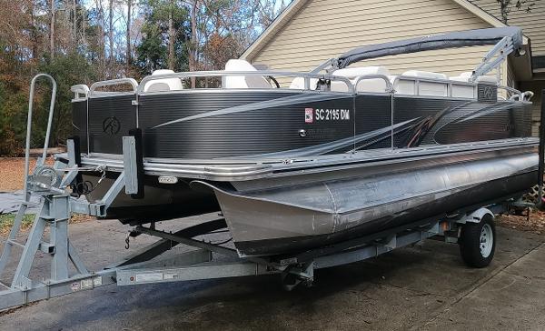 Avalon GS Quad Fish - 21' 2020 Avalon GS Quad Fish pontoon boat on trailer, parked in driveway.