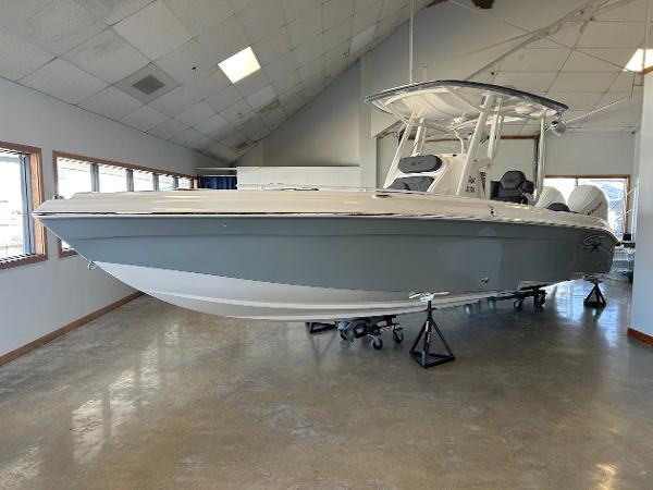 Glasstream 28 GSX Pro 2024 Glasstream 28 GSX Pro boat displayed indoors on stands.