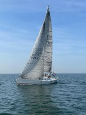 Jeanneau Sun Fast 36 1997 Jeanneau Sun Fast 36 sailboat on calm sea under clear blue sky.