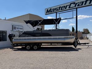 Crest Classic DLX 240 SLRC 2024 Crest Classic DLX 240 SLRC pontoon boat on trailer at dealership.