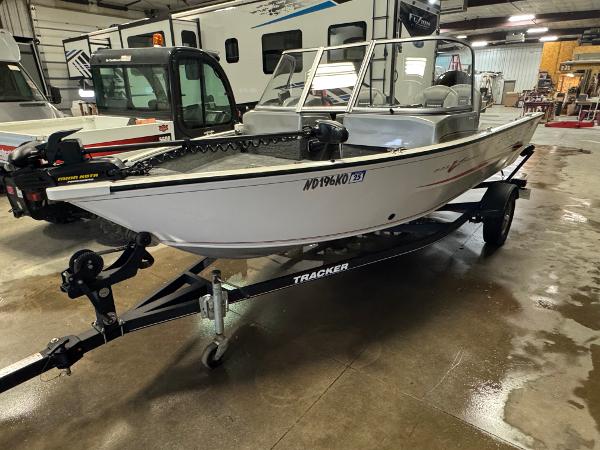 Tracker Pro Guide V-16 WT 2018 Tracker Pro Guide V-16 WT boat on trailer in indoor storage facility.