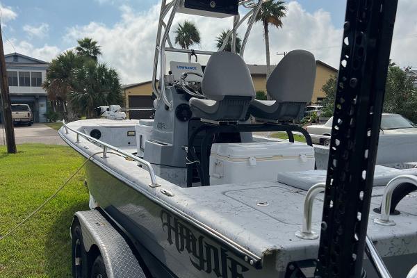 Haynie 25 Magnum 2019 Haynie 25 Magnum boat on trailer, parked in residential area.
