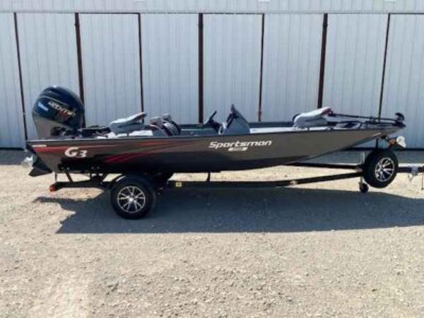 G3 Sportsman 1710 2025 G3 Sportsman 1710 fishing boat on trailer, parked outdoors.