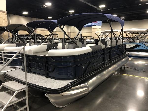 Bennington S Swingback 22 SSB 2025 Bennington S Swingback 22 SSB pontoon boat displayed indoors with canopy.