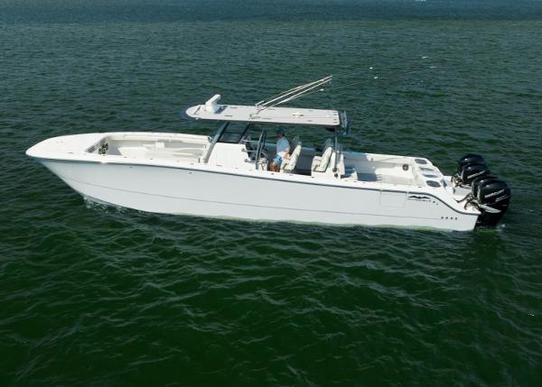 Invincible 46 Catamaran 2022 Invincible 46 Catamaran cruising on open water, side view.