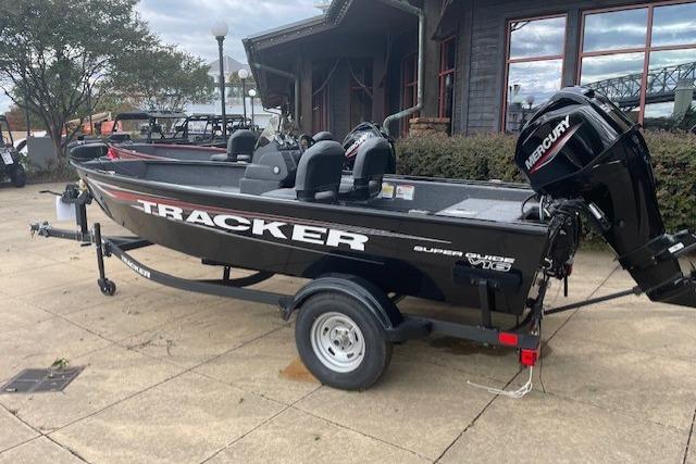 Tracker Super Guide V-16 SC 2026 Tracker Super Guide V-16 SC boat with Mercury engine on trailer.