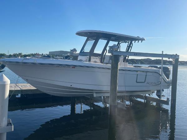 Robalo R272 Center Console 2022 Robalo R272 Center Console boat docked on a lift.