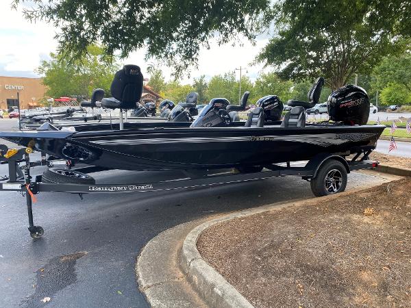 Ranger RT198P 2024 Ranger RT198P black fishing boat on trailer in outdoor setting.