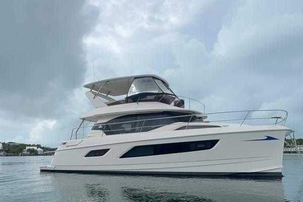Aquila 44 Yacht 2018 Aquila 44 Yacht on calm water under cloudy sky.