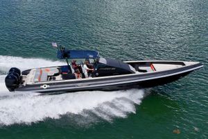 Technohull OMEGA 45 2019 Technohull OMEGA 45 speedboat cruising on water with passengers onboard.