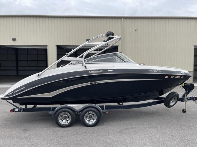 Yamaha Boats 242 Limited S 2012 Yamaha Boats 242 Limited S on trailer, parked outside a warehouse.