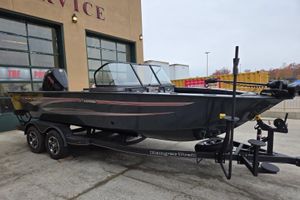 Ranger VX1988 WT 2026 Ranger VX1988 WT boat on trailer outside service center.