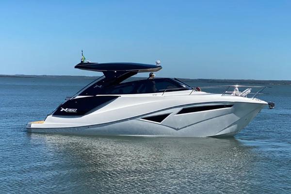NX Boats 360 Sport Coupe 2025 NX Boats 360 Sport Coupe on calm water, sleek design, modern luxury yacht.