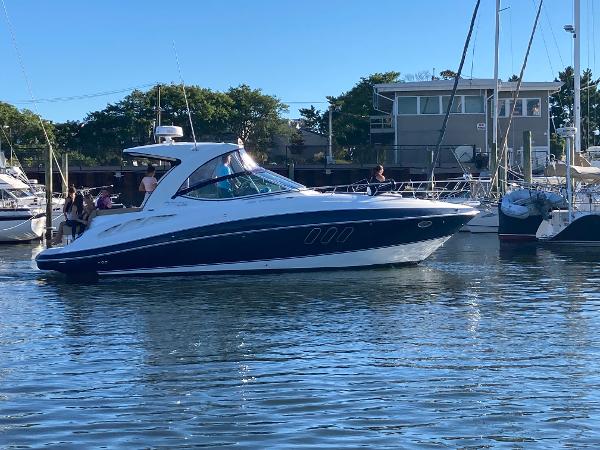 Cruisers Yachts 350 Express 2015 Cruisers Yachts 350 Express in marina, sunny day, calm waters.