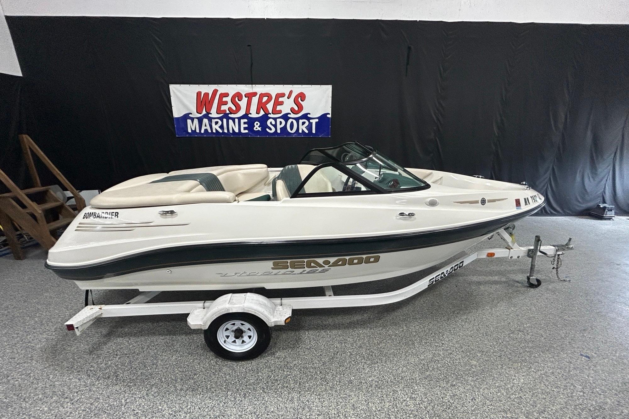 Sea-Doo Utopia 185 2001 Sea-Doo Utopia 185 boat on trailer at Westre's Marine & Sport showroom.