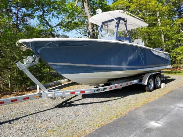Southport 27 Center Console 2013 Southport 27 Center Console boat on trailer, parked outdoors.