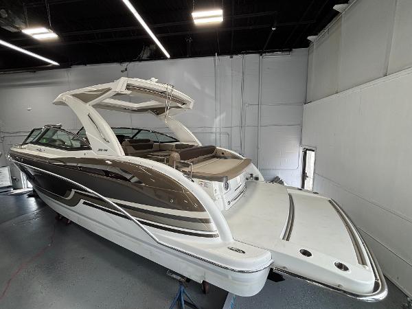 Formula 350 Crossover Bowrider I/O 2019 Formula 350 Crossover Bowrider I/O in showroom, sleek design, luxury features.