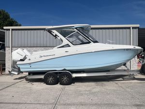 Finseeker 280 DC 2023 Finseeker 280 DC boat on trailer, light blue hull, parked outdoors.
