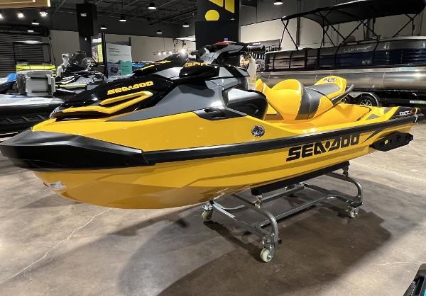 Sea-Doo RXT X 300 2023 Sea-Doo RXT X 300 in showroom, yellow and black jet ski on display.