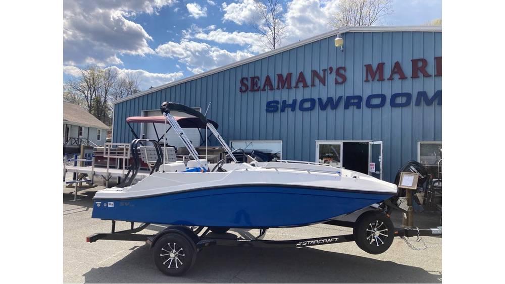 Starcraft SV 16 OB 2025 Starcraft SV 16 OB boat displayed outside Seaman's Marine showroom.