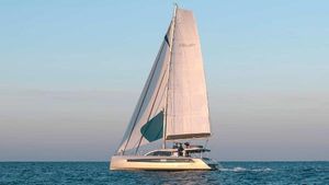 Privilege signature 580 Luxury Privilege Signature 580 catamaran sailing on calm sea, 2025 model.