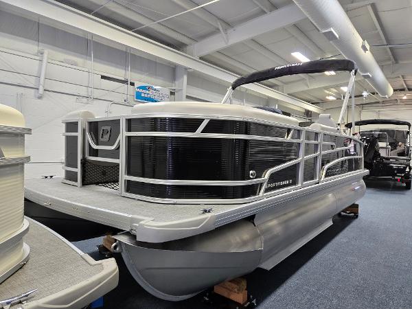 Princecraft Sportfisher 21-2RS 2025 Princecraft Sportfisher 21-2RS pontoon boat displayed indoors.