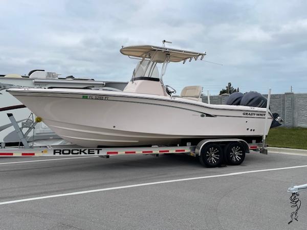 Grady-White Fisherman 257 2014 Grady-White Fisherman 257 boat on Rocket trailer in parking lot.