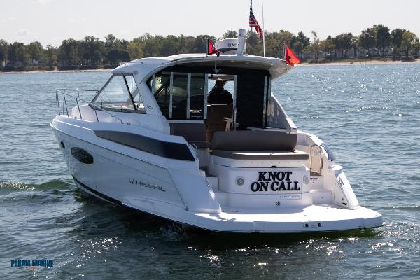 Regal 42 Sport Coupe Knot on Call resting on lake erie