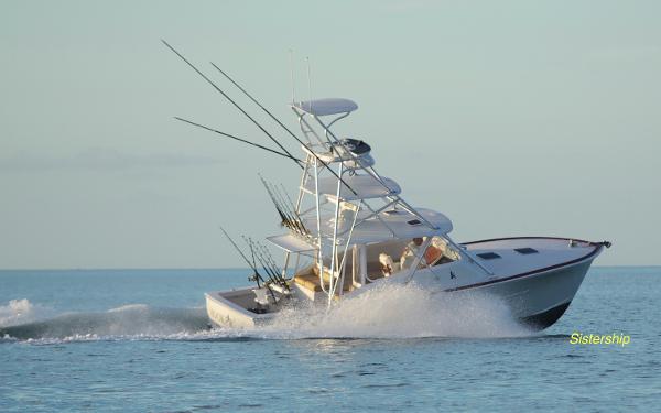 Release Boatworks 36 Express 2025 Release Boatworks 36 Express cruising on open water, equipped for fishing.