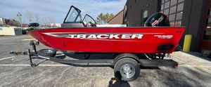 Tracker Pro Guide V-175 WT 2025 Tracker Pro Guide V-175 WT boat in vibrant red on a trailer.