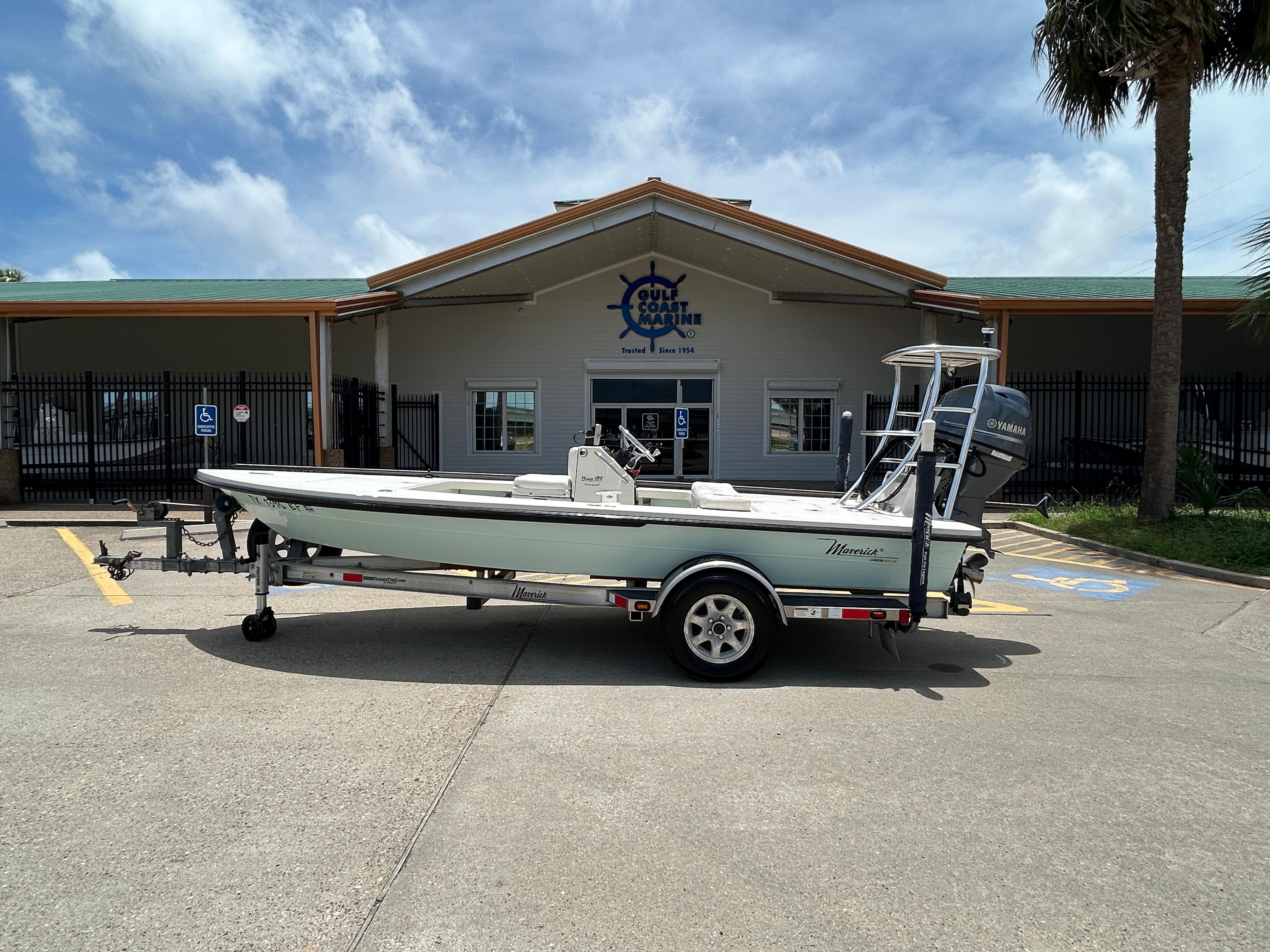 Maverick Mirage 17HPX-Tunnel 2011 Maverick Mirage 17HPX-Tunnel boat on trailer outside Gulf Coast Marine building.