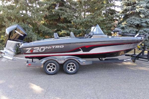 Nitro ZV20 Pro 2024 Nitro ZV20 Pro fishing boat on trailer, parked outdoors.
