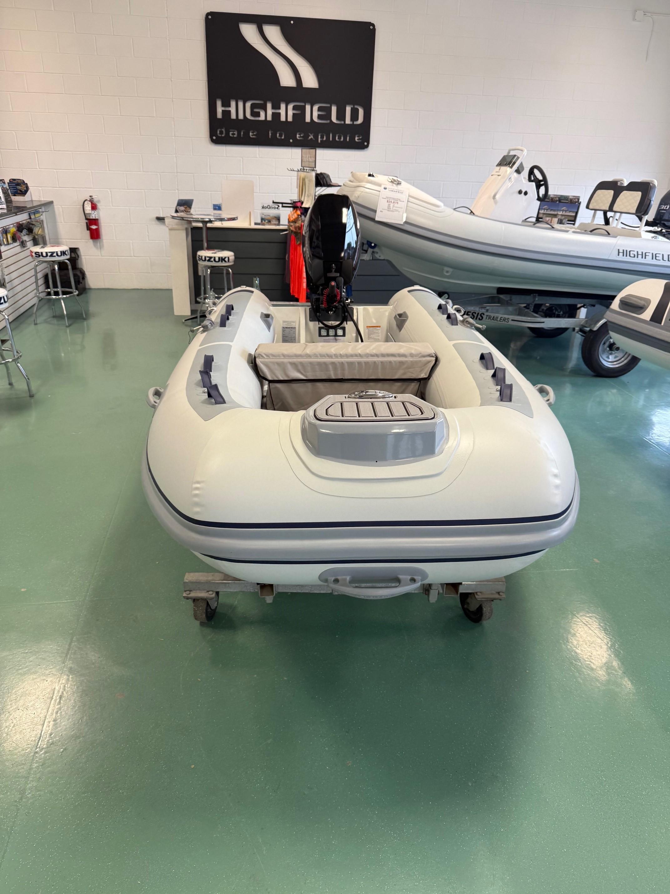 Highfield CL360 2024 Highfield CL360 inflatable boat displayed in showroom with green floor.