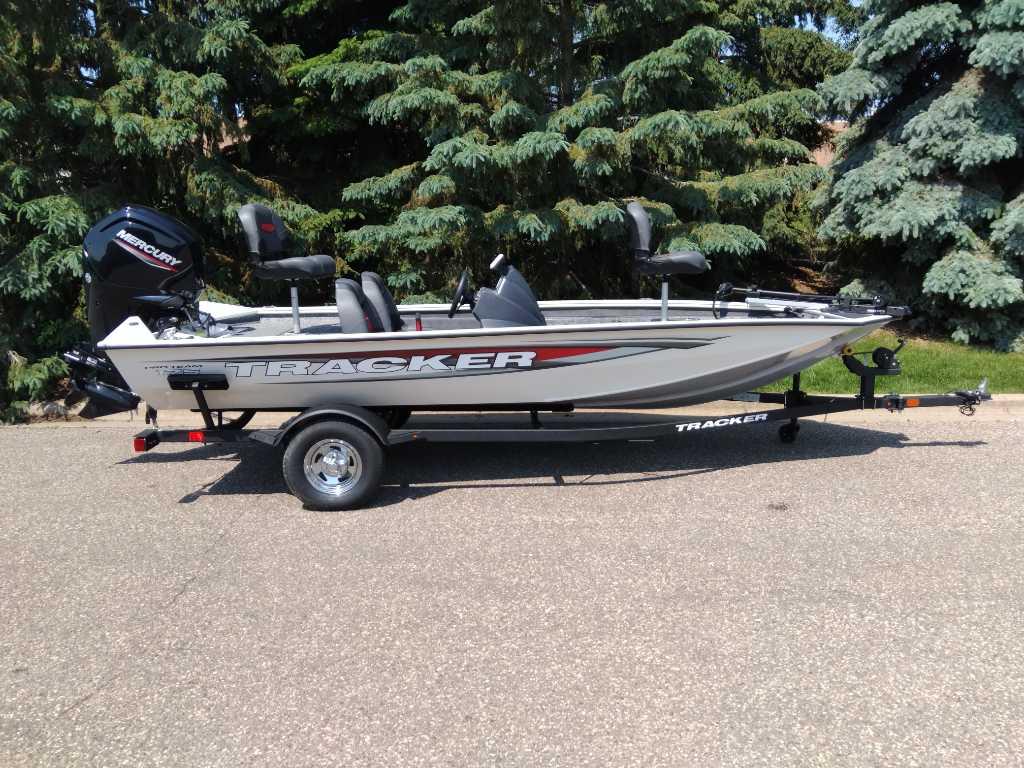 Tracker Pro Team 175 2025 Tracker Pro Team 175 boat on trailer, parked outdoors.