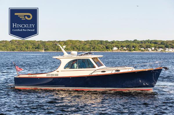 Hinckley Picnic Boat 37 MKIII 2018 Hinckley Picnic Boat 37 MKIII cruising on water, certified pre-owned.