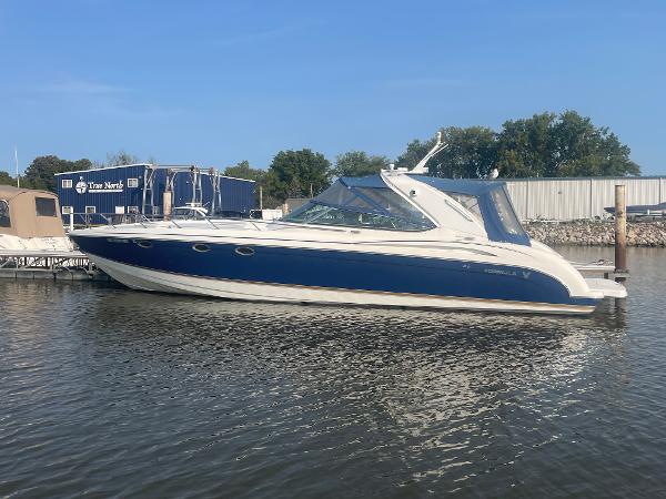 Formula 400 Super Sport 2002 Formula 400 Super Sport boat docked on calm water.