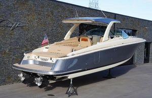 Chris-Craft Launch 35 GT 2024 Chris-Craft Launch 35 GT boat displayed on stands, featuring sleek design and luxury seating.