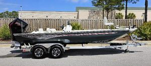 Ranger RB210 2024 Ranger RB210 boat on a trailer, parked outdoors.