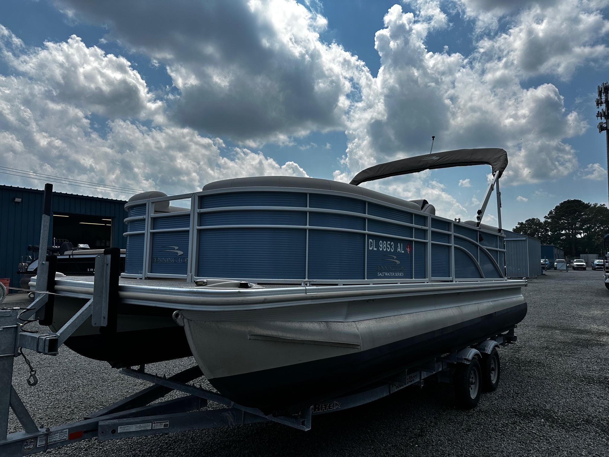 Bennington SSRX Pontoon 22 2019 Bennington SSRX Pontoon 22 on trailer under cloudy sky.