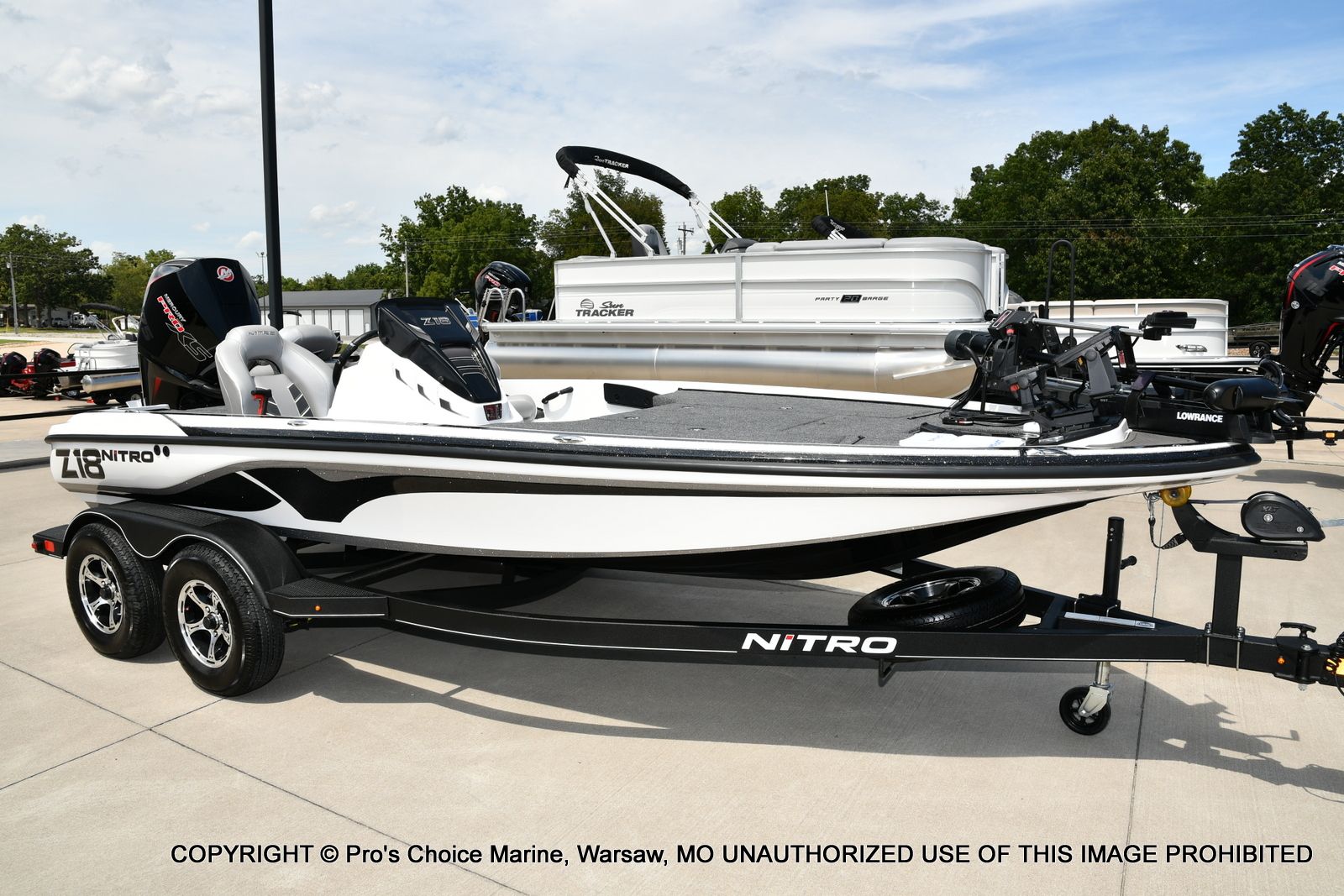 Nitro Z18 Pro w/175 Pro-XS 2024 Nitro Z18 Pro boat with 175 Pro-XS engine on trailer, outdoor display.