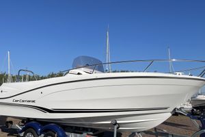 Jeanneau Cap Camarat 6.5 CC Serie 3 2026 Jeanneau Cap Camarat 6.5 CC Serie 3 boat on trailer under clear blue sky.