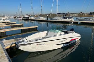 Northmaster 645 Open 2022 Northmaster 645 Open boat docked in a marina under clear blue skies.