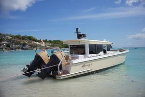 Custom Amando 37 Custom Amando 37 boat anchored in clear turquoise water, 2018 model.