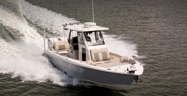 Solace 28 HCS 2025 Solace 28 HCS boat cruising on water, showcasing sleek design and performance.