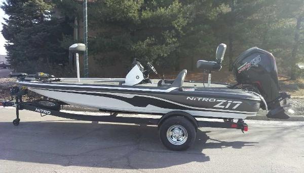 Nitro Z17 2025 Nitro Z17 fishing boat on trailer, parked outdoors.