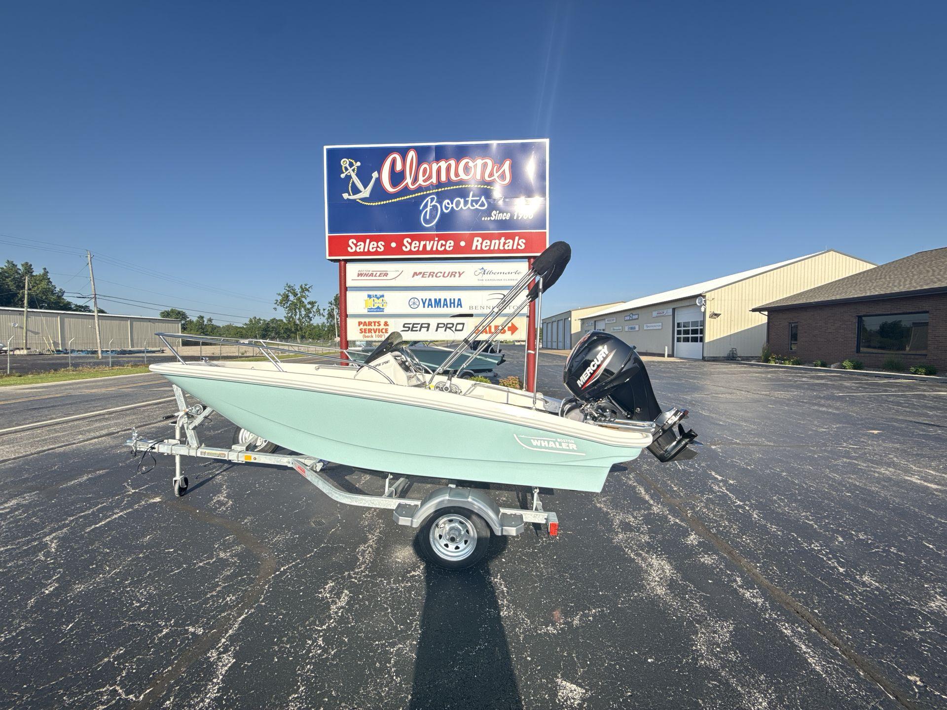 Boston Whaler 130 Super Sport 2025 Boston Whaler 130 Super Sport boat on trailer at Clemons Boats dealership.